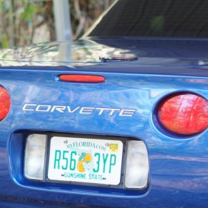 Polished stainless back lettering