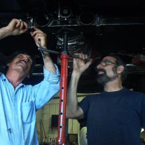 Make a Removeable Crossmember and swap the Muncie for the Richmond