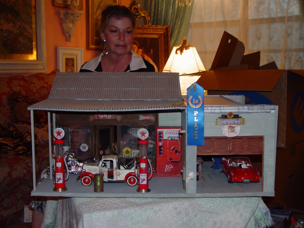 Dollmaker and her handiwork.